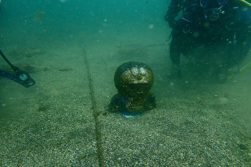 Doraemon underwater statue truth: metal statue found in ocean seabed
